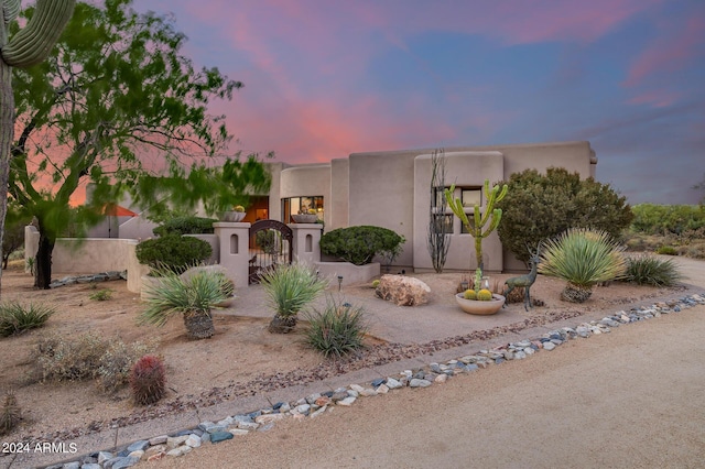 view of pueblo revival-style home