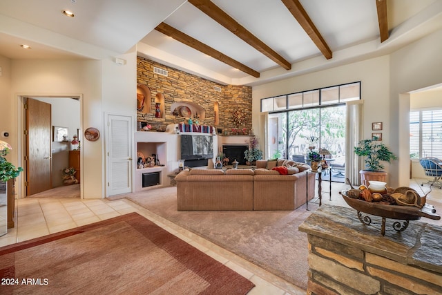 tiled living room featuring beam ceiling and a towering ceiling