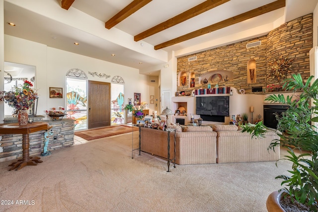 living room with beam ceiling, light colored carpet, and french doors