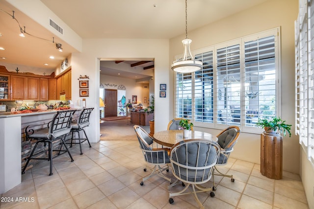 dining space with light tile patterned flooring