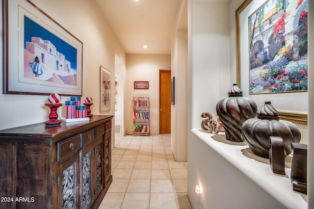 corridor featuring light tile patterned flooring