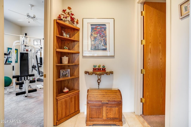 hallway with light colored carpet