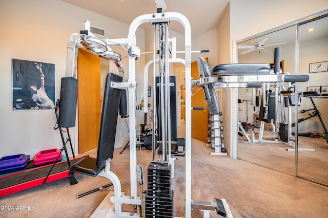 exercise room featuring light carpet and ceiling fan