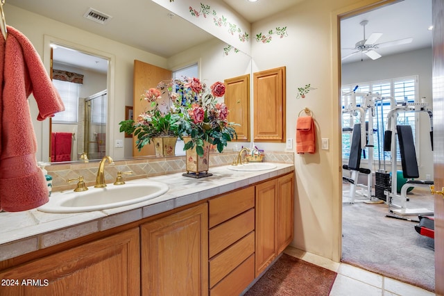 bathroom with vanity, tile patterned floors, plenty of natural light, and ceiling fan