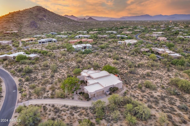 aerial view at dusk with a mountain view