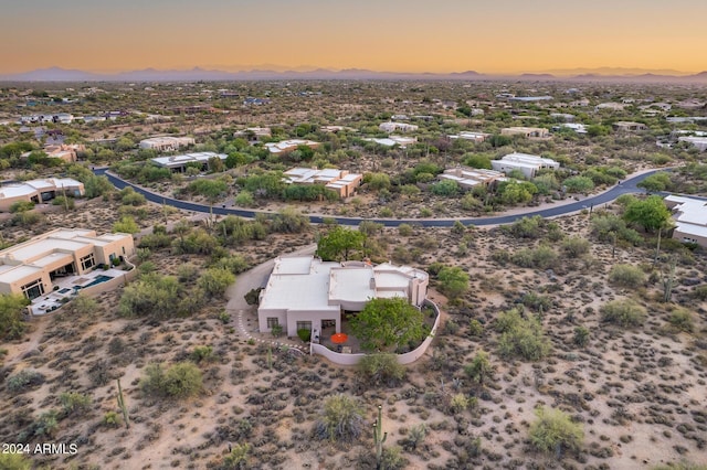 view of aerial view at dusk