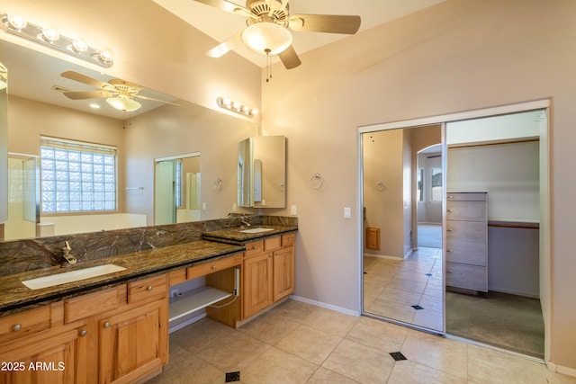 bathroom featuring vanity, tile patterned floors, and ceiling fan