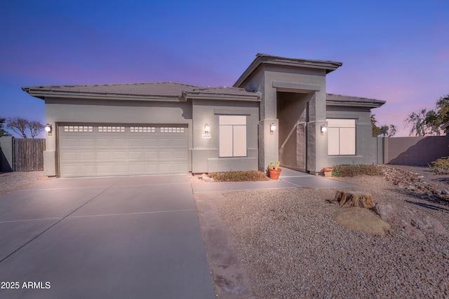 view of front of home with a garage