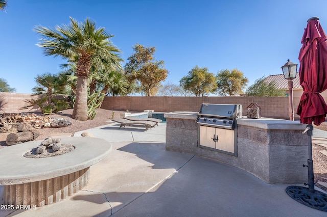 view of patio featuring area for grilling and grilling area