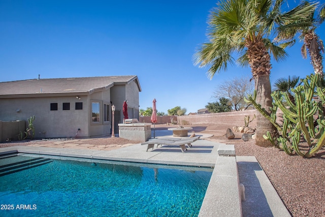 view of pool with a patio