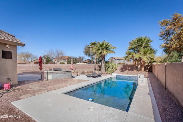 view of pool featuring a patio area