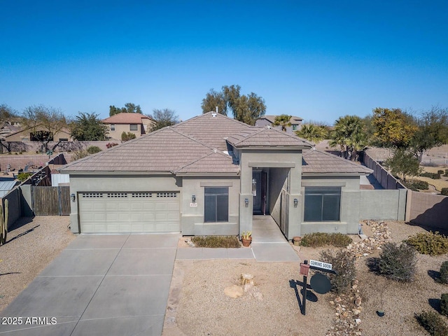 view of front of home with a garage