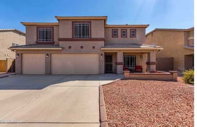 4321 E Morenci Rd, San Tan Valley, AZ 85143 - view of front of home featuring a garage, concrete driveway, and stucco siding