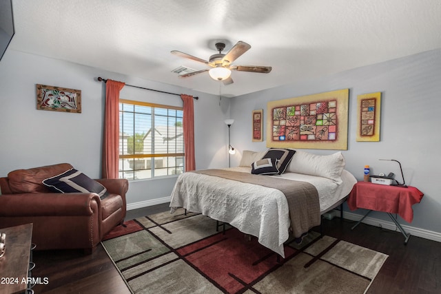 4321 E Morenci Rd, San Tan Valley, AZ 85143 - bedroom with baseboards, wood finished floors, and a ceiling fan