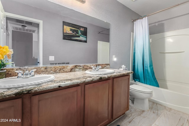 4321 E Morenci Rd, San Tan Valley, AZ 85143 - full bathroom featuring toilet, double vanity, shower / tub combo, and marble look tile flooring