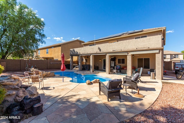 4321 E Morenci Rd, San Tan Valley, AZ 85143 - view of swimming pool featuring a fenced backyard, ceiling fan, a patio area, and outdoor lounge area