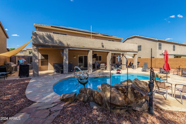 4321 E Morenci Rd, San Tan Valley, AZ 85143 - view of pool with a fenced backyard, a patio, and area for grilling