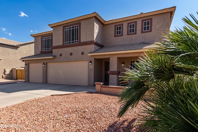 4321 E Morenci Rd, San Tan Valley, AZ 85143 - view of front of home featuring an attached garage, stucco siding, and driveway