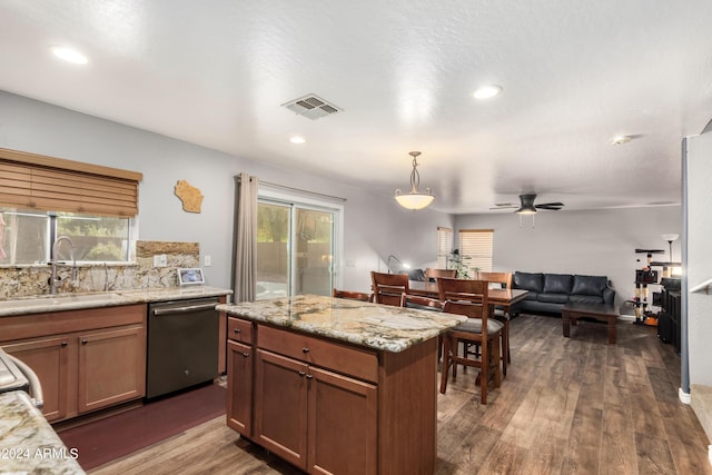 4321 E Morenci Rd, San Tan Valley, AZ 85143 - kitchen featuring dishwasher, a sink, healthy amount of natural light, decorative backsplash, and recessed lighting