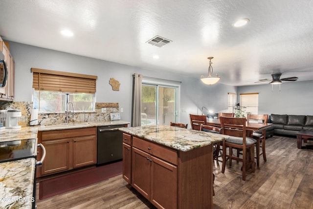 4321 E Morenci Rd, San Tan Valley, AZ 85143 - kitchen with stainless steel appliances, a sink, dark wood-style floors, tasteful backsplash, and open floor plan