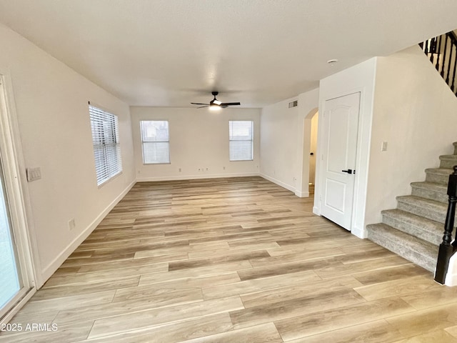 interior space featuring ceiling fan and light hardwood / wood-style floors