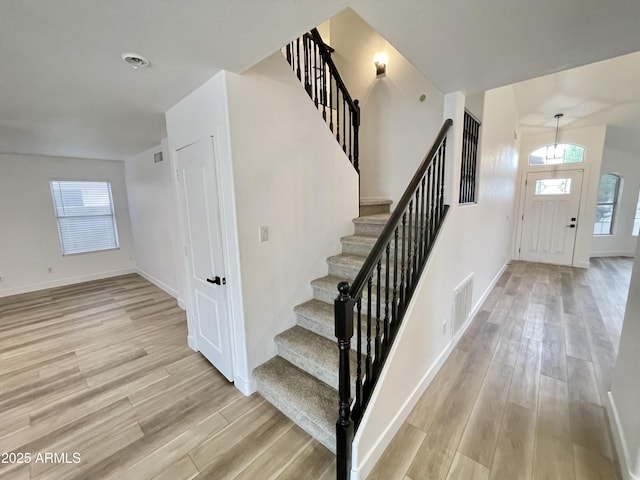 foyer with light wood-type flooring