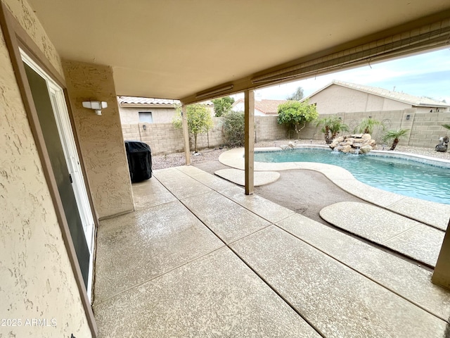 view of pool with a patio area