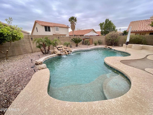 view of pool featuring pool water feature