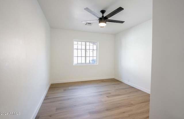 unfurnished room featuring ceiling fan and light hardwood / wood-style flooring