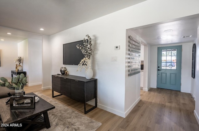 foyer with light wood-type flooring