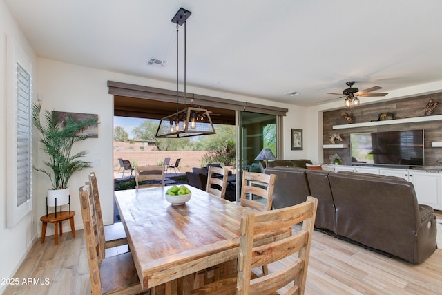 4350 Stage Stop Way, Wickenburg, AZ 85390 - dining space with light wood-style flooring and a ceiling fan