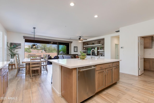 4350 Stage Stop Way, Wickenburg, AZ 85390 - kitchen featuring light countertops, a sink, a ceiling fan, light wood-style floors, and recessed lighting