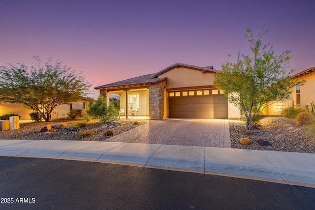4350 Stage Stop Way, Wickenburg, AZ 85390 - single story home with driveway, a garage, stucco siding, and stone siding