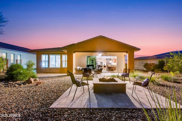 4350 Stage Stop Way, Wickenburg, AZ 85390 - patio terrace at dusk featuring a patio area