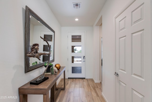 4350 Stage Stop Way, Wickenburg, AZ 85390 - doorway to outside featuring light wood finished floors, baseboards, and recessed lighting