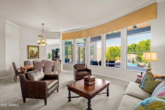 carpeted living room with plenty of natural light, crown molding, and a notable chandelier