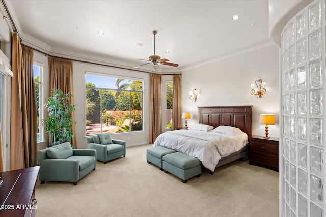 bedroom featuring ceiling fan, crown molding, and light colored carpet