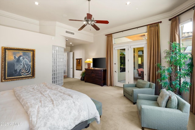 carpeted bedroom with ceiling fan, ornamental molding, and access to outside