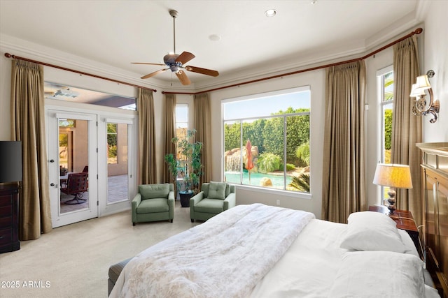 bedroom with ceiling fan, crown molding, light carpet, and access to outside