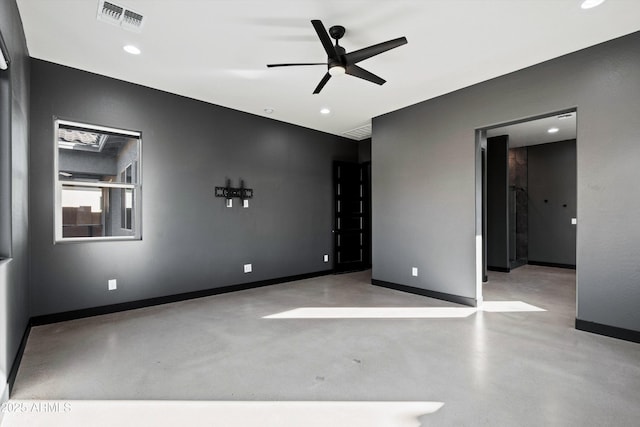 empty room featuring ceiling fan