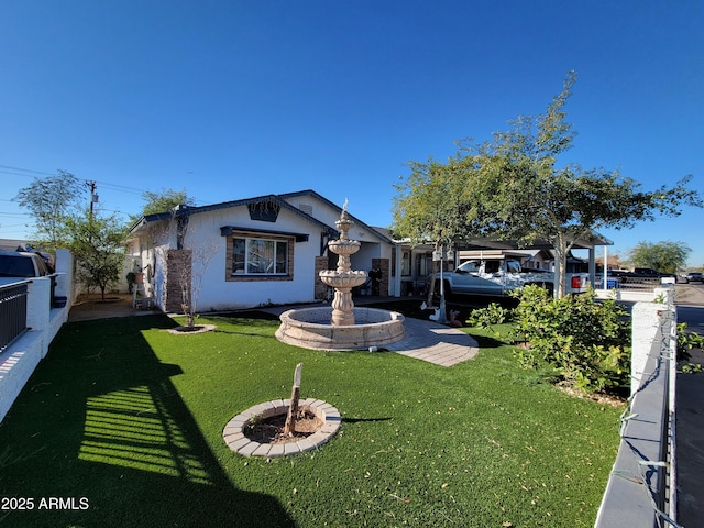 view of front facade with a front lawn