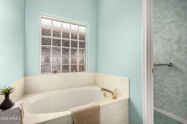 bathroom with a washtub