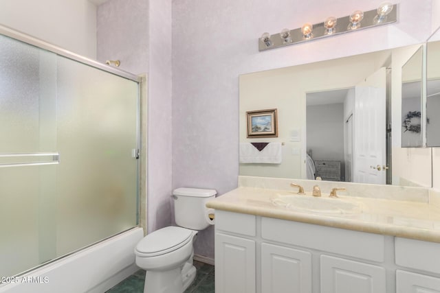 full bathroom with toilet, tile patterned floors, vanity, and shower / bath combination with glass door