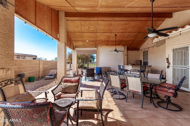 view of patio featuring ceiling fan