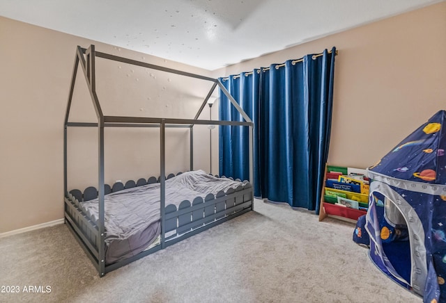 bedroom featuring carpet flooring