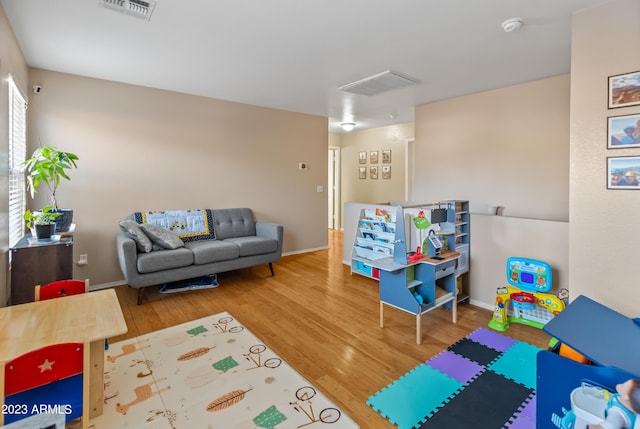 rec room featuring hardwood / wood-style flooring