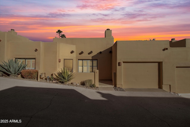 view of pueblo revival-style home