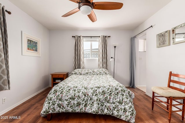 bedroom with dark wood-style floors, baseboards, and a ceiling fan