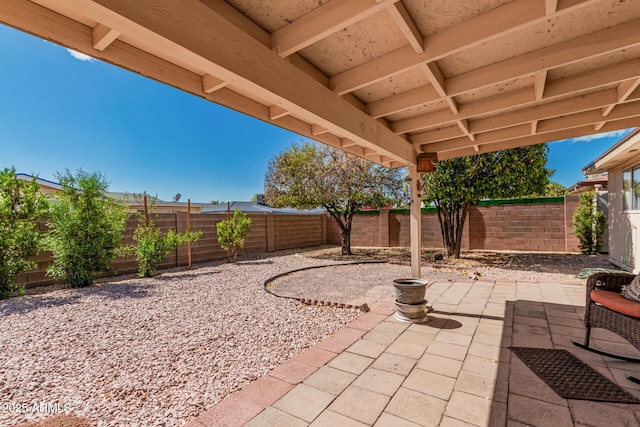 view of patio with a fenced backyard