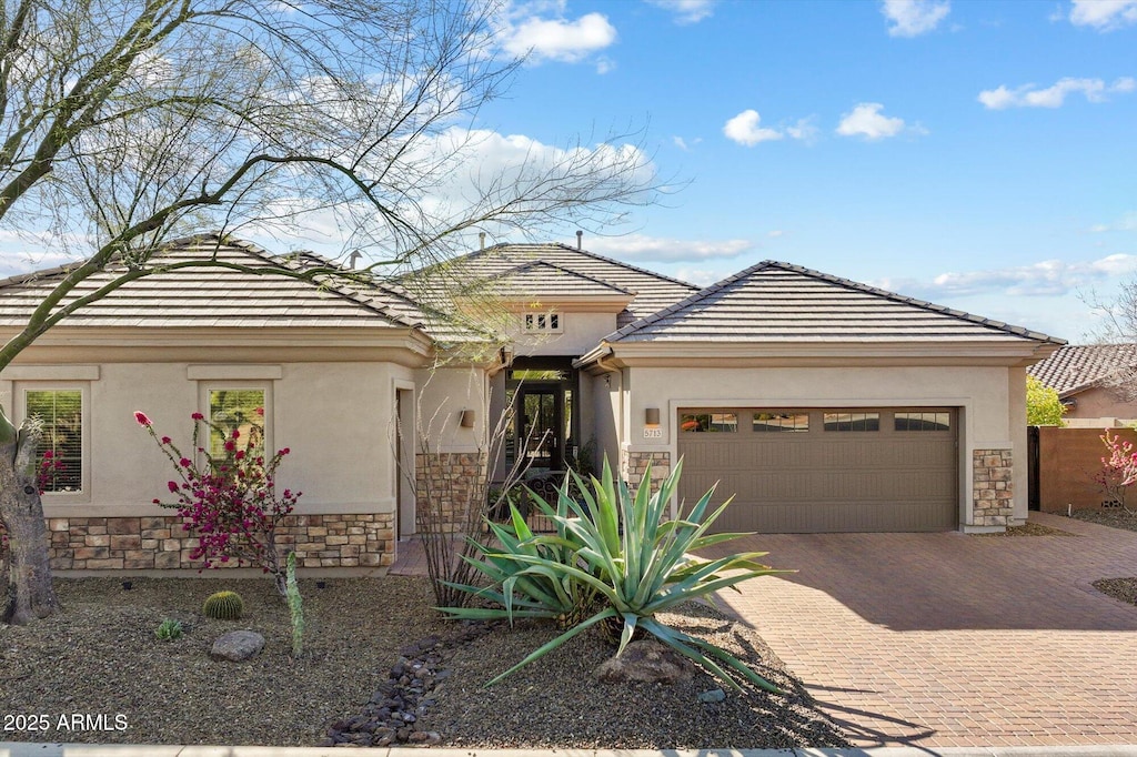 view of front of property featuring a garage